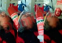 Video revoltător! Paramedic de pe o ambulanță SMURD, filmat în timp ce lovește un pacient cu o bucată de salam în cap