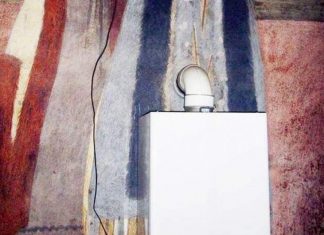 Centrală termică montată peste o pictură veche de peste 200 de ani, într-o biserică din Târgu Jiu. Cum au reacționat enoriașii