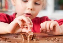 Iohannis a promulgat legea privind dublarea alocațiilor pentru copii