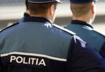 Un polițist și-a amenințat colegii cu pistolul și ar fi vrut să se sinucidă